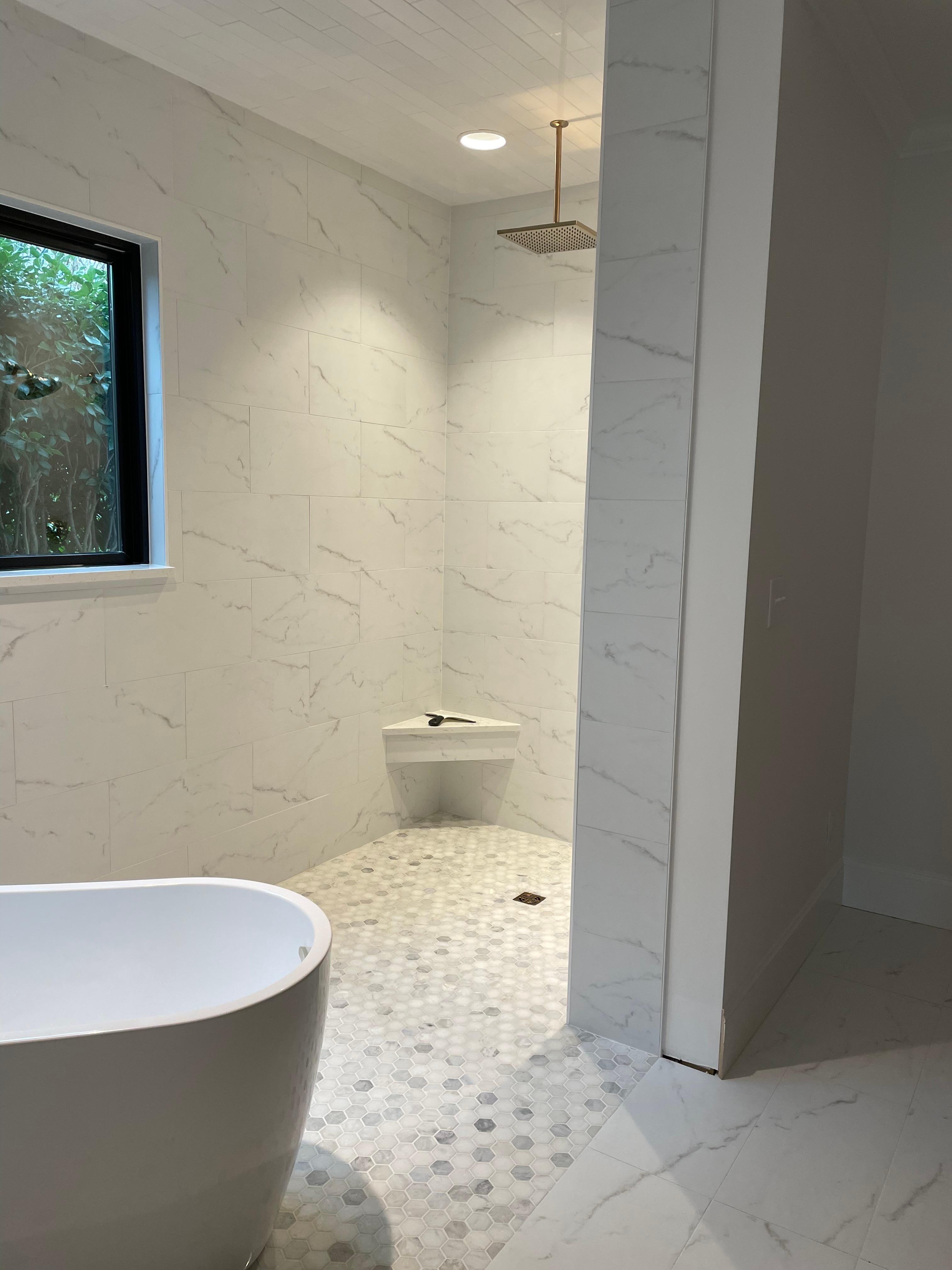 Bathroom tile installation with freestanding tub