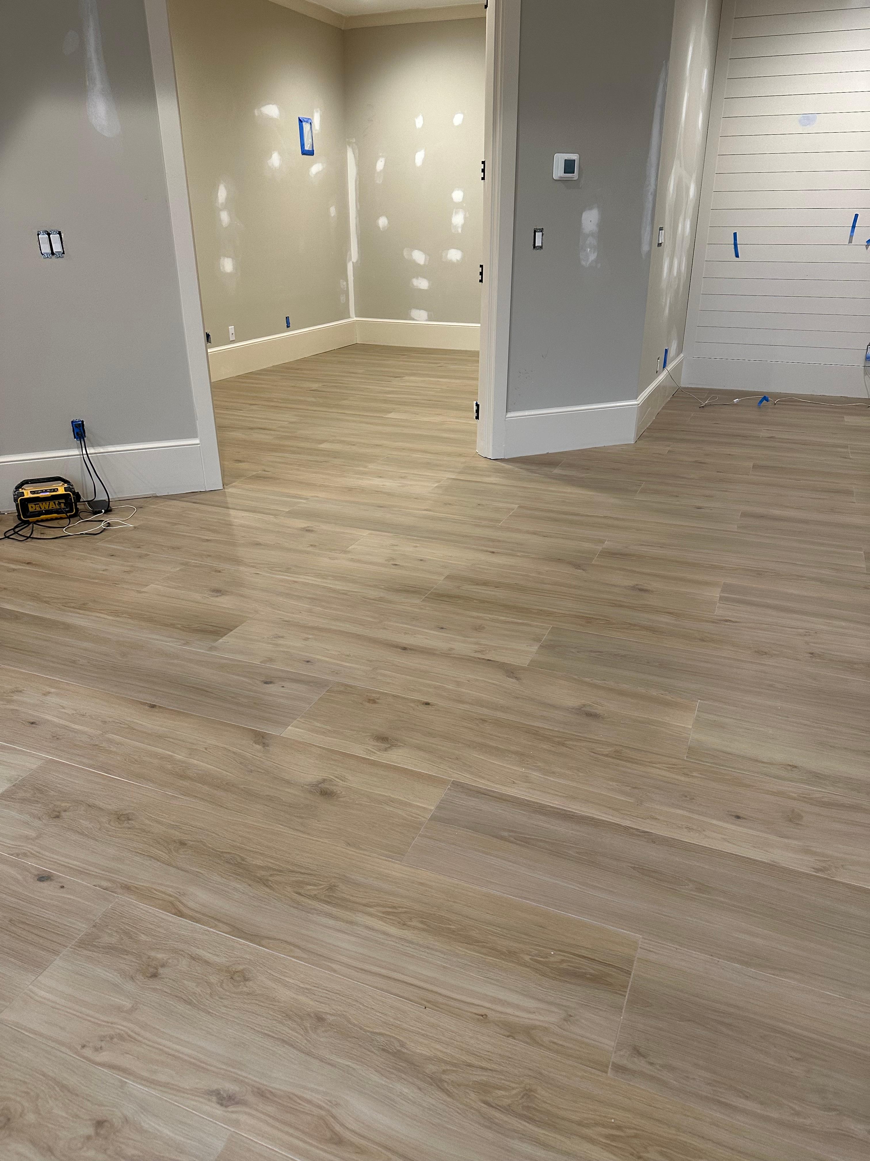Flooring tile installation in progress