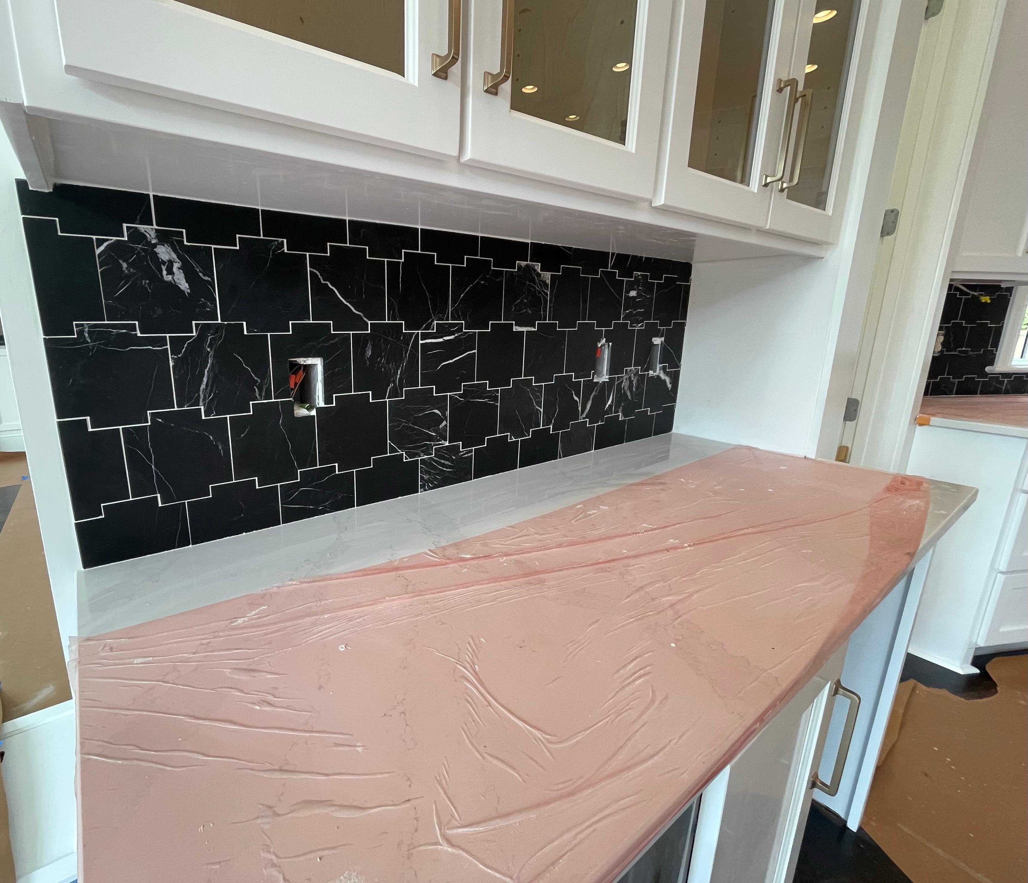 Modern kitchen with stone backsplash